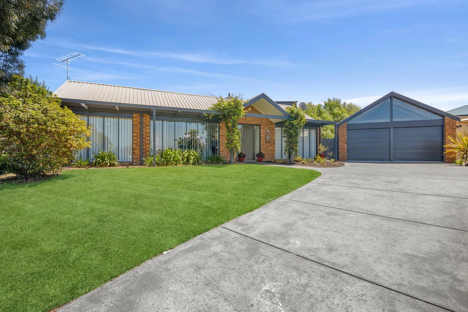 Off-street parking and a welcoming front lawn set the first impression.